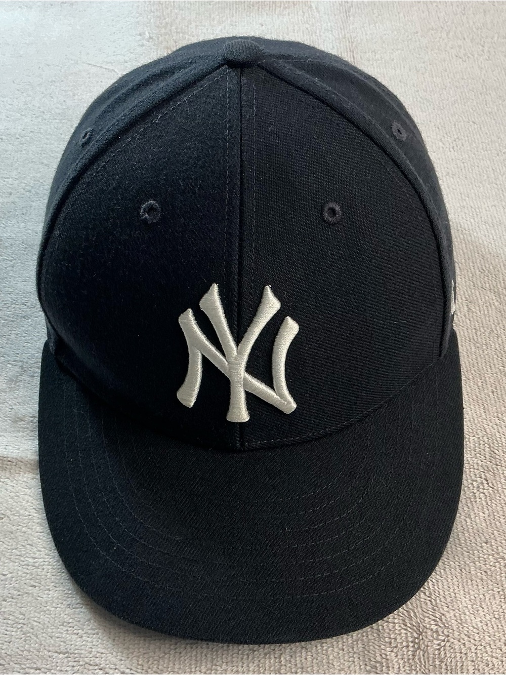 New Era Black Cap with White Yankees Script